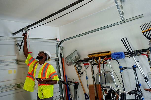Professional Garage Door Panel Replacement technician working in Harrisonville, MO